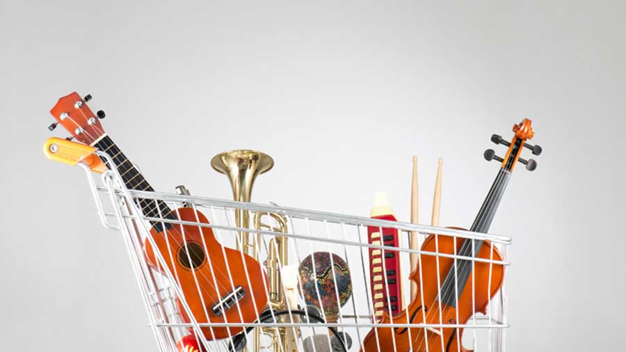 Musical instruments in a shopping trolley ready for hire