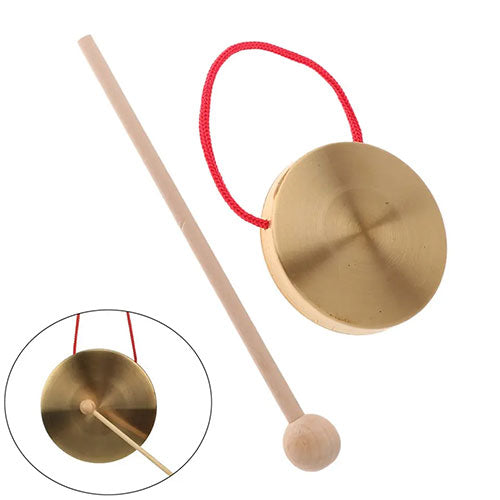 Small brass gong with red hanging loop and solid wood beater mallet