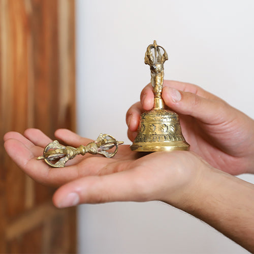 ghanta bell in hand